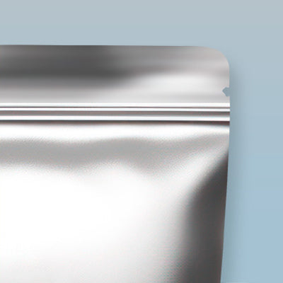 Metallic silver flex pouch on a light blue background